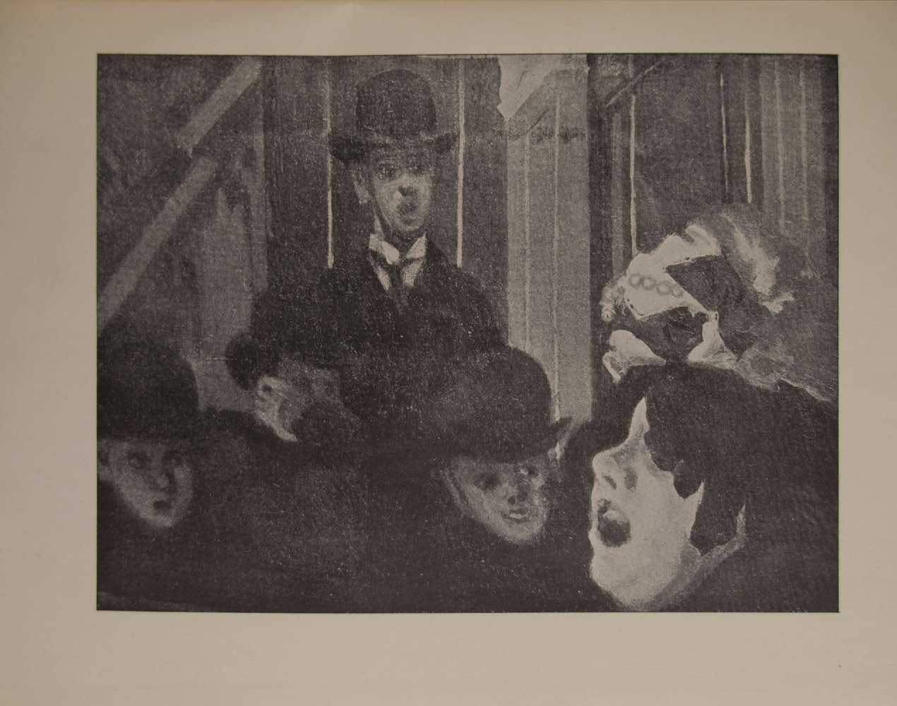 The image is of a crowd of people gathered around a singing woman in a music hall In the bottom right hand corner there is the face of the woman in profile with open mouth She is wearing fancy head dress She may be missing a tooth Facing the viewer and singer is a row of men in hats The image is displayed horizontally
