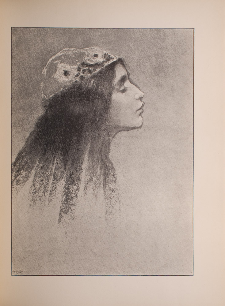 Image is of the head of a young woman with long dark hair in profile facing right She is wearing a white patterned cap and her eyes are closed The image is vertically displayed