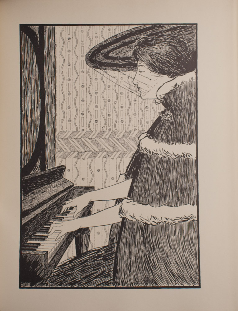 The image is of a woman in profile playing piano The woman is facing left and looking strait ahead She is wearing a large hat with a veil over her face She is also wearing a cloak with a high collar and a decorative clasp at the neck There is a fur trim at the collar and around the body of the cloak The wall behind the woman has patterned wallpaper The image is vertically displayed