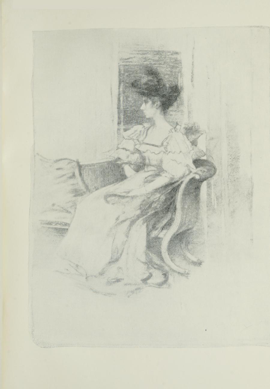 Image is of a woman sitting on a settee She is shown in profile looking left She is wearing a light coloured dress with ruffled sleeves and a low neckline Her hair is up she is wearing a hat Her hands are resting on her lap A window is behind her The image is vertically displayed