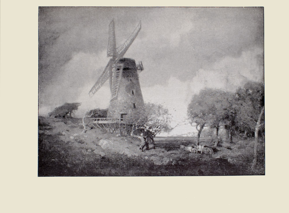 Image is of a windmill in a field The windmill is made out of stone with four shuttered blades these blades divide the image in half vertically The windmill is placed atop a stage Behind and to the right of the windmill are clusters of trees several craggy trees are also in front of it There is horse and wagon in the grass on the right The sky is light with several clouds The image is horizontally displayed
